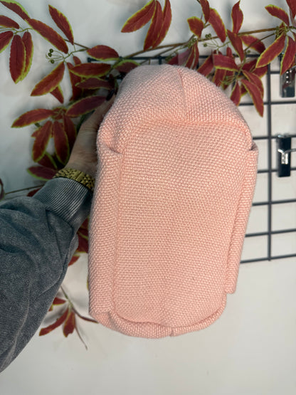 Bolso rosa de mano y bandolera
